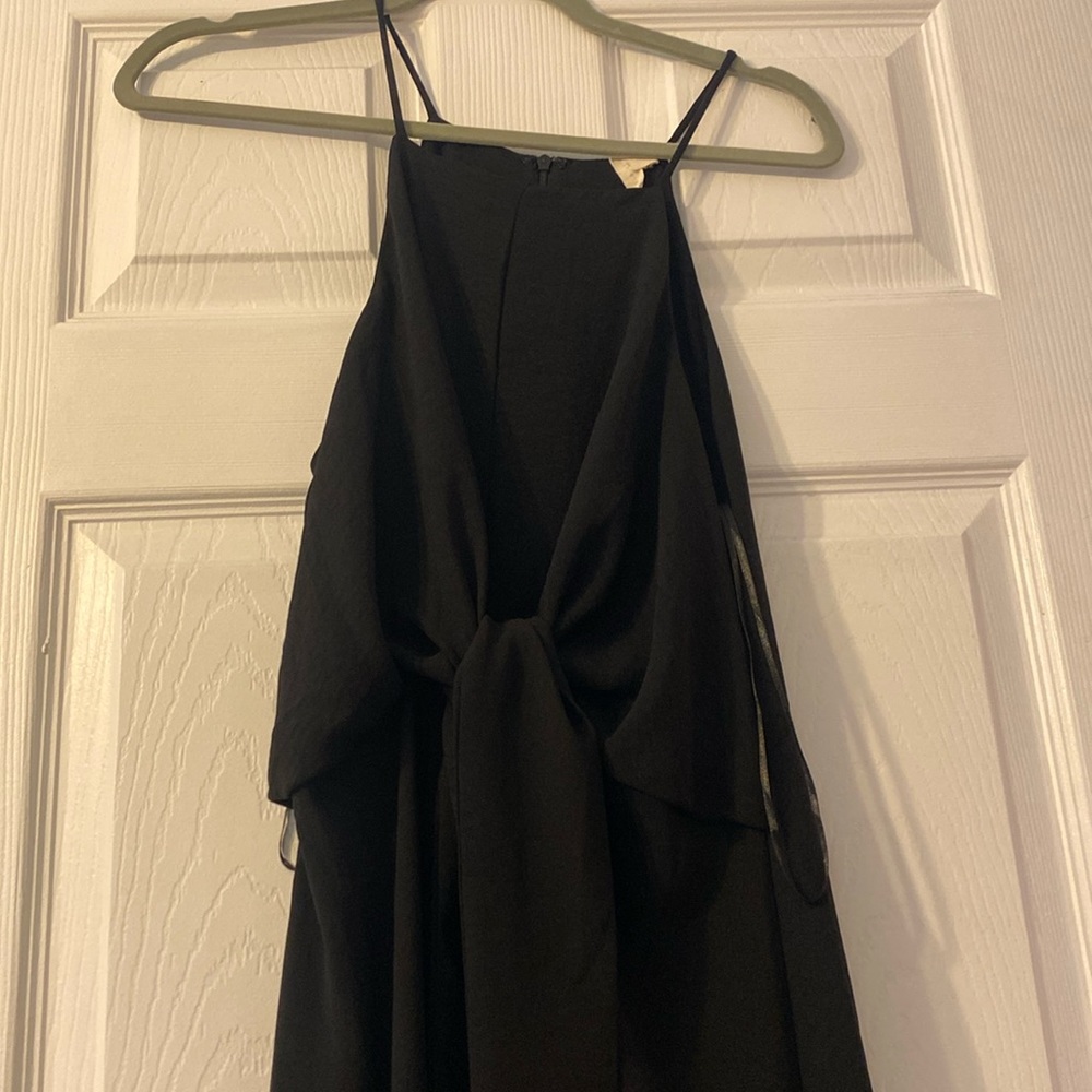 Black midi dress size medium. Never worn/ new with tags.